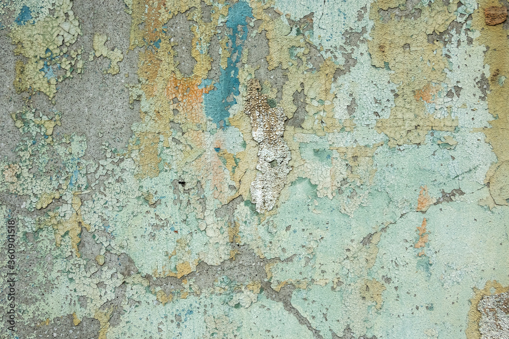 cement wall with colorful dirty cracked texture