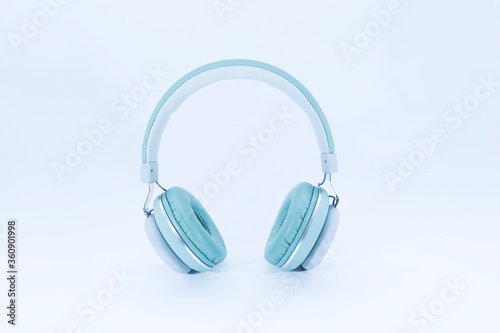 View of single headphone on white background 