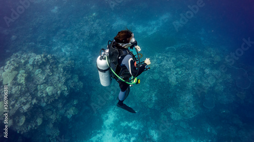 The scuba girl remains ingraved on the deep coral bottom. Munda (Solomon Islands)