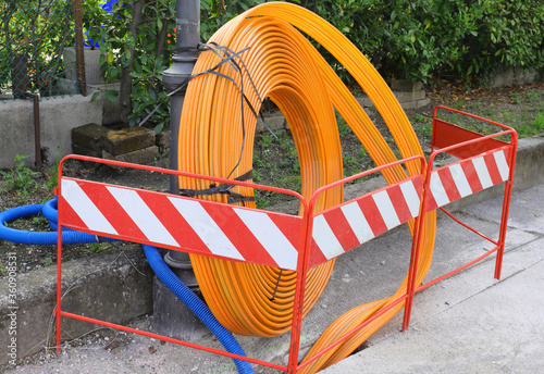 pipe to lay the fiber optic infrastructure in a city road constr photo