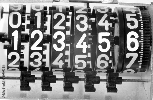 Obraz na płótnie large numbers of an analog meter of the electricity consumed by