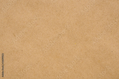 Brown eco recycled kraft paper sheet texture cardboard background