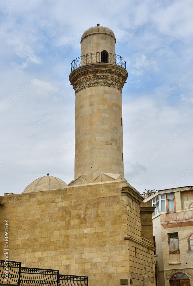 Baku, Azerbaijan, Beyler (Beylyar, Beglyar) minaret of mosque of 1894-1895 years of construction, Ilyas Efendiyev street, 47