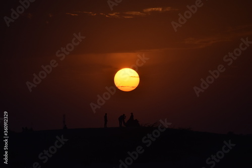 Fototapeta Naklejka Na Ścianę i Meble -  desert safari at jaisalmer sam dunes in a sunset time