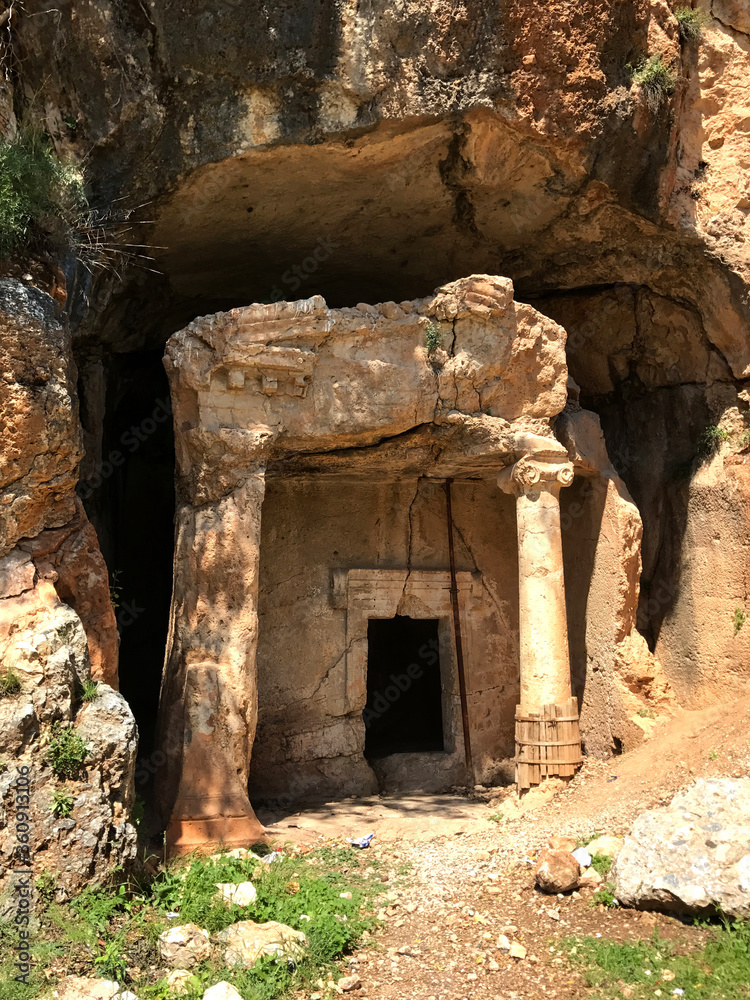 An ancient rock tomb in Akyaka, Turkey.