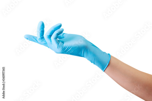 Doctor's hand in sterile medical gloves showing something isolated on white