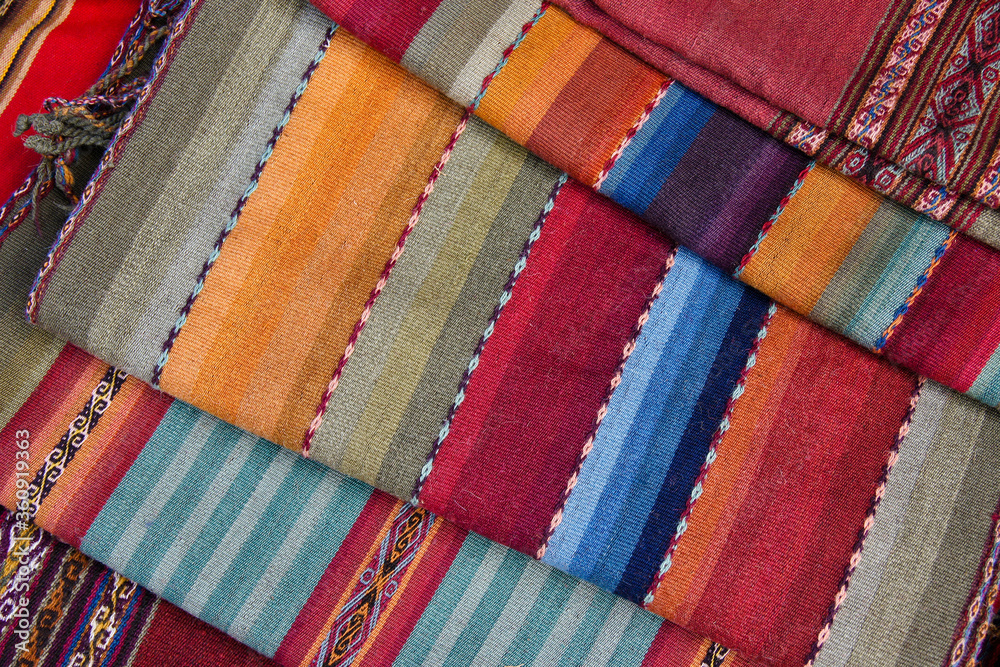 Woven textiles for sale in the market, Chinchero, Peru Woven textiles for sale in the market, Chinchero, Peru