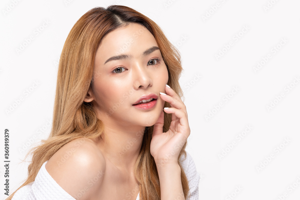 Beautiful Asian woman look at camera smile with clean and fresh skin