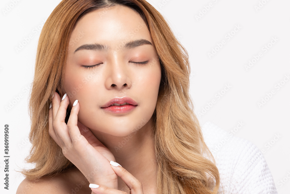 Beautiful Asian woman look at camera smile with clean and fresh skin Beautiful Asian woman look at camera smile with clean and fresh skin