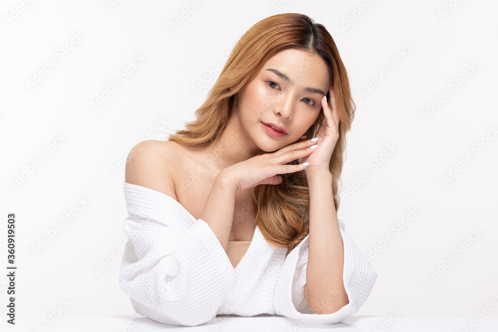 Beautiful Asian woman look at camera smile with clean and fresh skin Beautiful Asian woman look at camera smile with clean and fresh skin