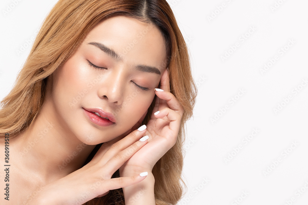 Beautiful Asian woman look at camera smile with clean and fresh skin Beautiful Asian woman look at camera smile with clean and fresh skin