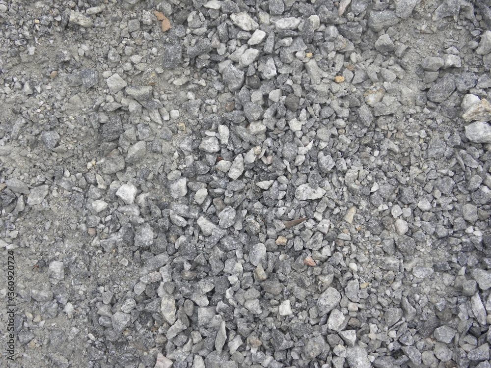 Small gray and white color stones textured background Small gray and white color stones textured background