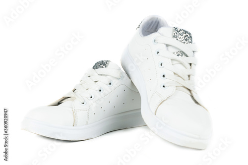 pair of white sneakers isolated on white background. comfortable sports shoes.