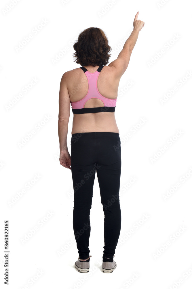 rear view of prengnant woman pointing on white background rear view of prengnant woman pointing on white background