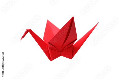 Red origami crane isolated on white