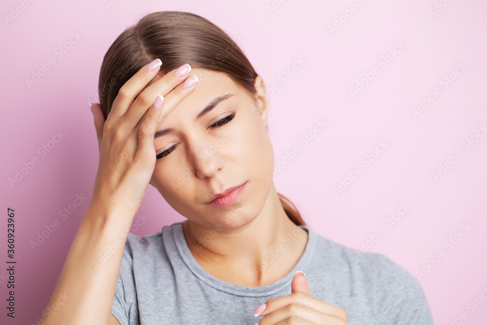 Head pain, exhausted young woman has suffering from unbearable headache Head pain, exhausted young woman has suffering from unbearable headache