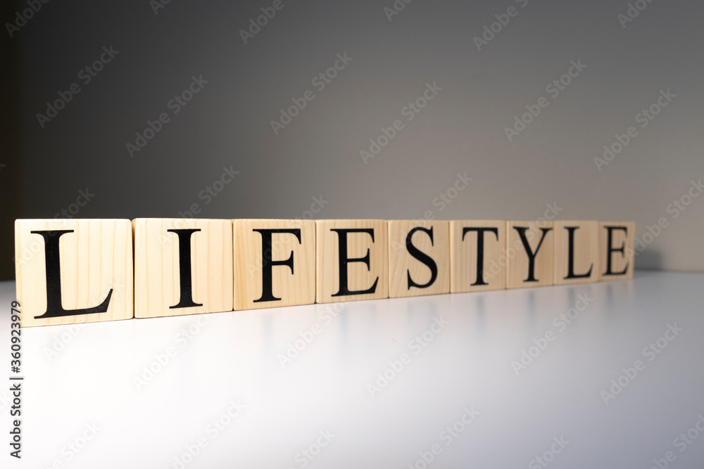 Lifestyle text from wooden cubes. New economic order and pandemic concept Lifestyle text from wooden cubes. New economic order and pandemic concept