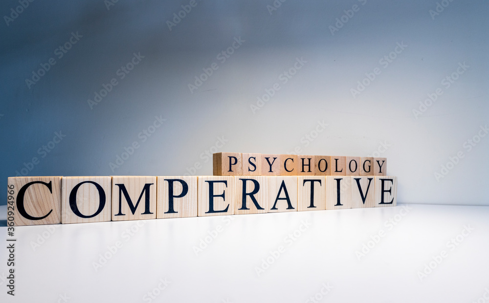 Comparative psychology text from wooden cubes. Close up. Comparative psychology text from wooden cubes. Close up.