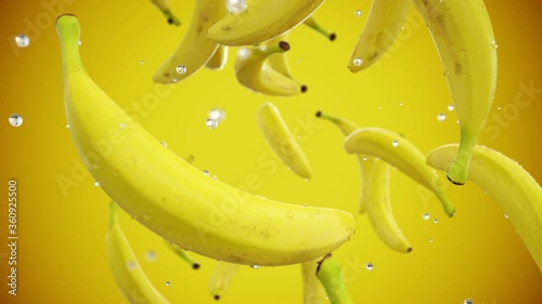 Fresh bananas falling with water drops. Slow motion. Realistic animation. Isolate with alpha channel
