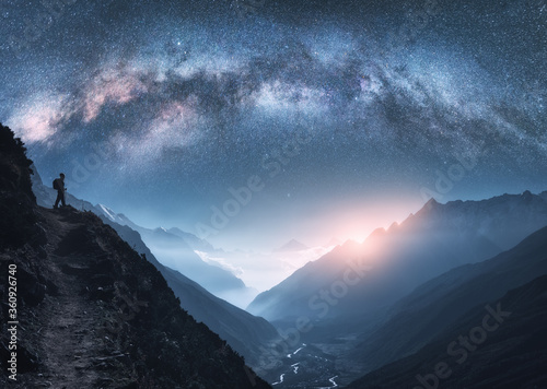 Arched Milky Way, woman and...
