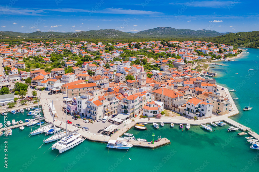 Croatia, Adriatic coastline, coastal town of Pirovac, waterfront view from drone
