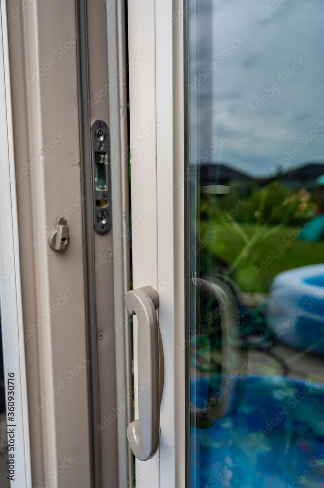 Handle, locking hardware, and jam to a sliding glass and screen door. Handle, locking hardware, and jam to a sliding glass and screen door.