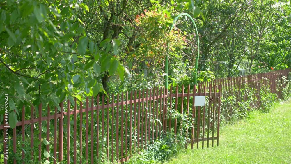 Entrance to vegetable garden in 4k slow motion 60fps Entrance to vegetable garden in 4k slow motion 60fps