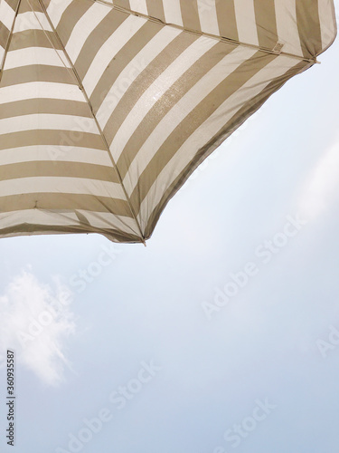 beach umbrella and blue sky