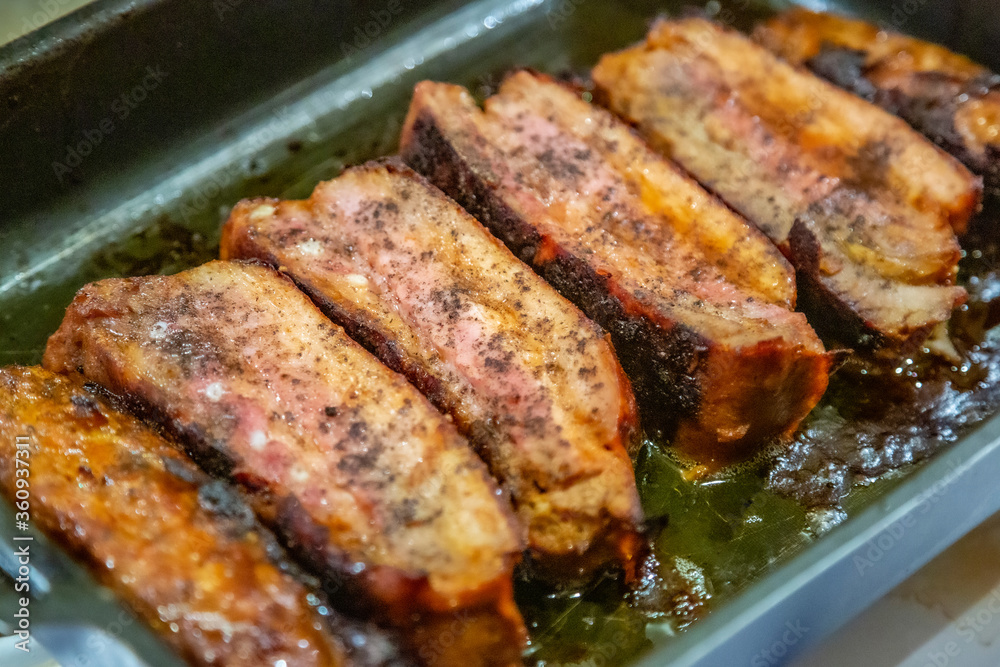 Juicy appetizing fat pork ribs for lunch or dinner