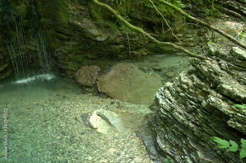 Grotta azzurra prende il nome dalla colorazione delle acque che sgorgano dalla roccia. photo