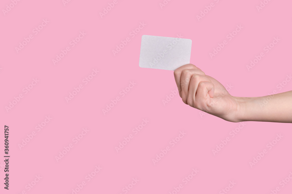 Caucasian hand hold business card, credit card or blank paper isolated Caucasian hand hold business card, credit card or blank paper isolated