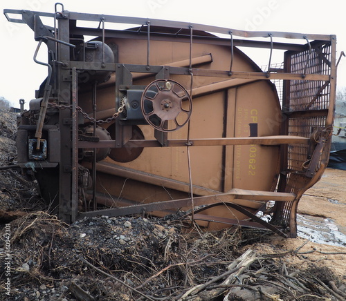 train wreck with tanker car on its side photo