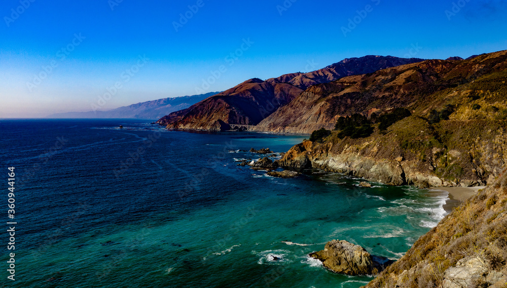 Naklejka premium Bixby Creek Bridge Big Sur Central Coast California afternoon haze fall day Pacific Coast Highway PCH