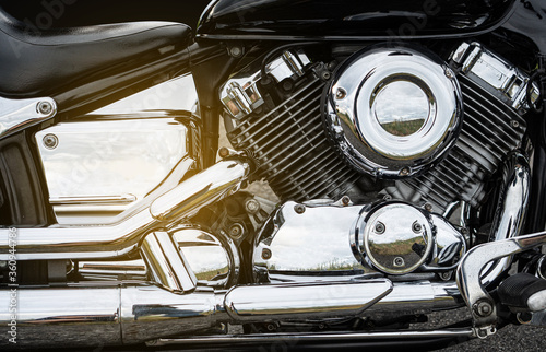 Motorcycle engine closeup background. Chromium details of motorbike.