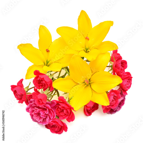 Flowers yellow lilies and pink roses with leaves isolated on white background. Beautiful bouquet. Creative spring concept. Floral pattern, object. Flat lay, top view