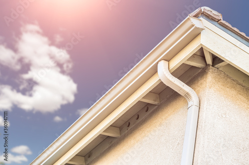 Bild auf Leinwand House with New Seamless Aluminum Rain Gutters