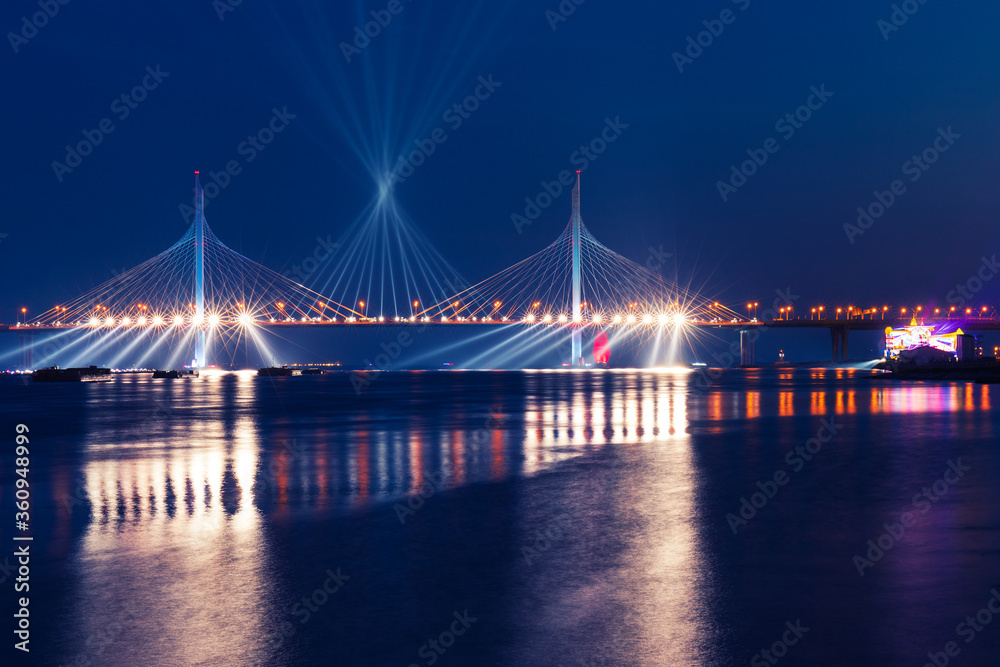 festive illumination over the bridge on Scarlet Sails celebration in St. Petersburg, Russia, in June 2020