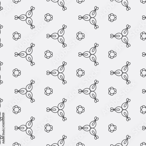 Beautiful monochromatic symmetrical designs on solid sheet of wallpaper. Concept of home decor and interior designing