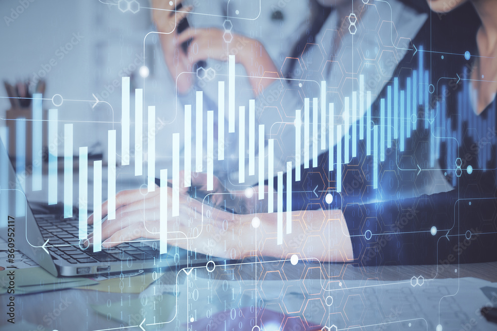 Multi exposure of woman hands typing on computer and financial graph hologram drawing. Stock market analysis concept. Multi exposure of woman hands typing on computer and financial graph hologram drawing. Stock market analysis concept.