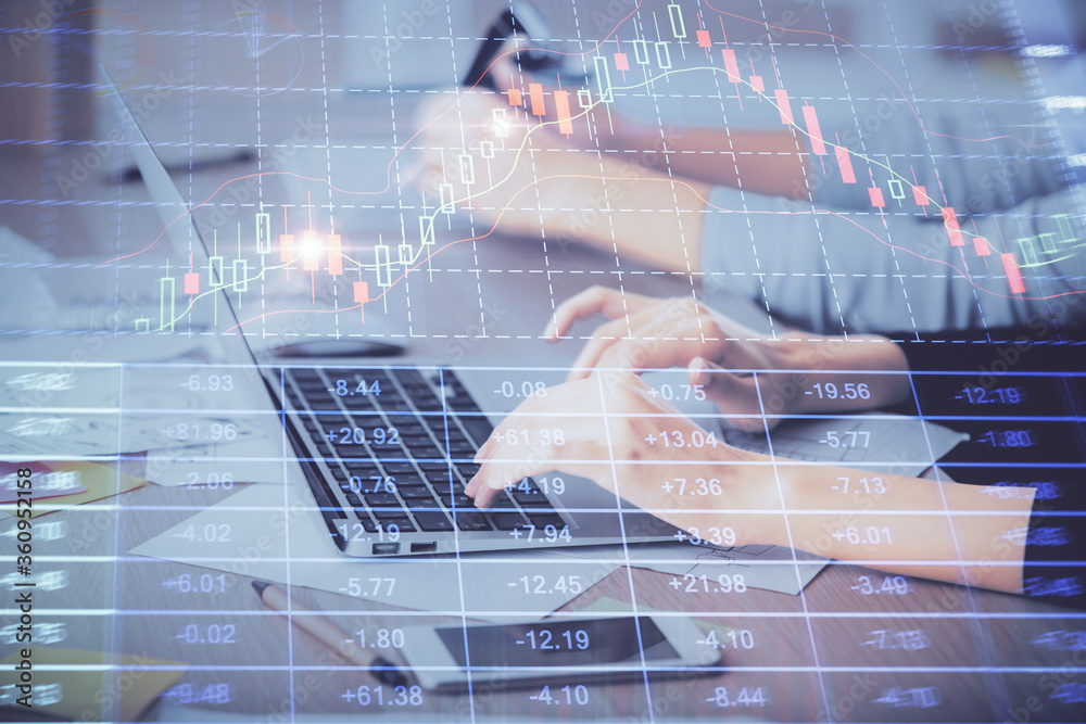 Multi exposure of woman hands typing on computer and financial graph hologram drawing. Stock market analysis concept. Multi exposure of woman hands typing on computer and financial graph hologram drawing. Stock market analysis concept.