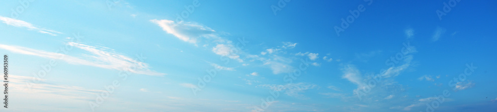 Blue sky with white clouds panoramic large shot. Background from the cloudy sky Blue sky with white clouds panoramic large shot. Background from the cloudy sky