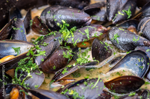 Moules-frites or moules et frites - a main dish of mussels and fries, considered to be the national dish of Belgium.