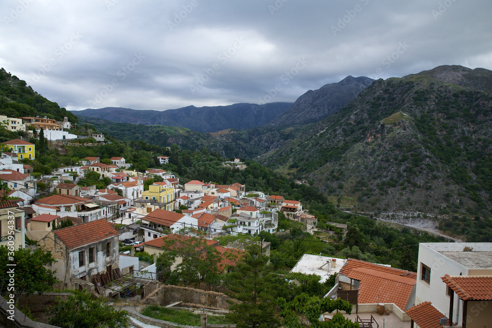 Center of the island of Crete, view of the village, houses and mountains.