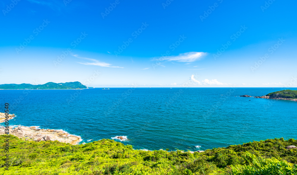 China Guangdong Shenzhen Dapeng Peninsula Dongchong coastline summer blue sky and white clouds scenery China Guangdong Shenzhen Dapeng Peninsula Dongchong coastline summer blue sky and white clouds scenery