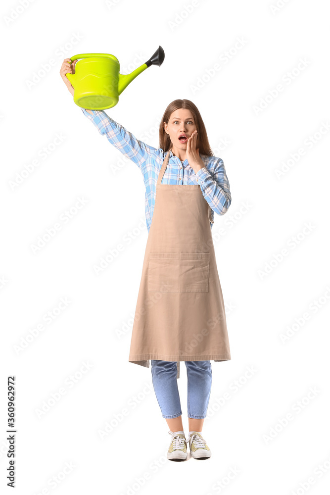Surprised young woman with watering can on white background Surprised young woman with watering can on white background