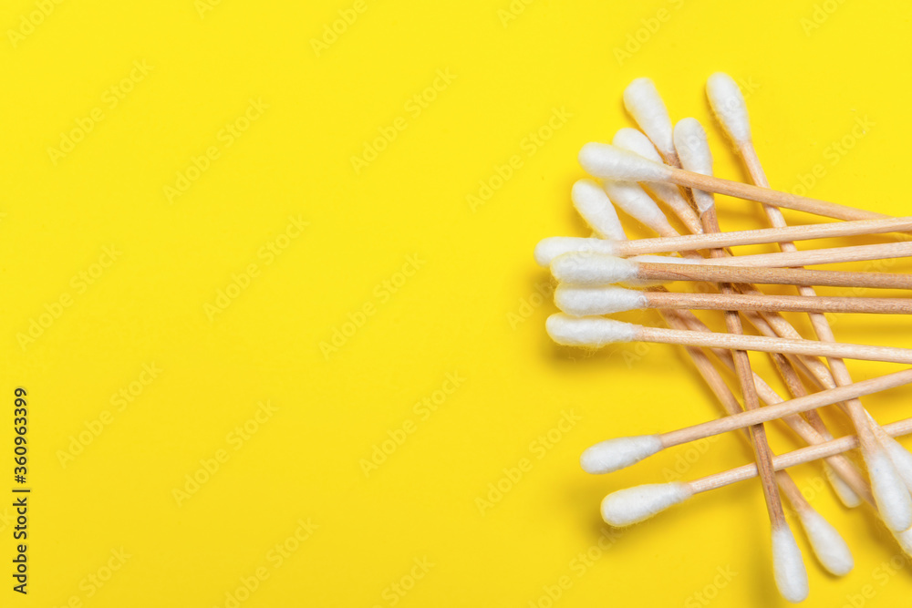 Cotton cosmetic swabs on color background Cotton cosmetic swabs on color background