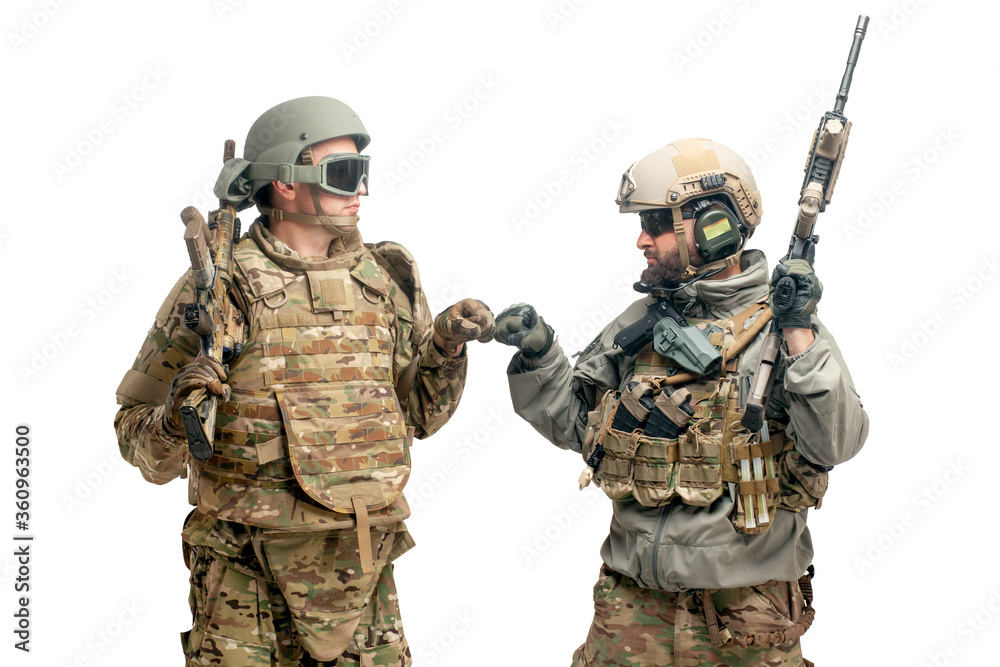 American special forces. two soldiers in military equipment with weapons on a white background, USA Army rejoices in success American special forces. two soldiers in military equipment with weapons on a white background, USA Army rejoices in success