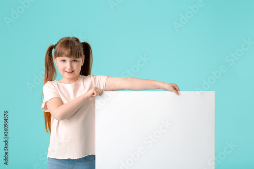 Little girl with blank post...