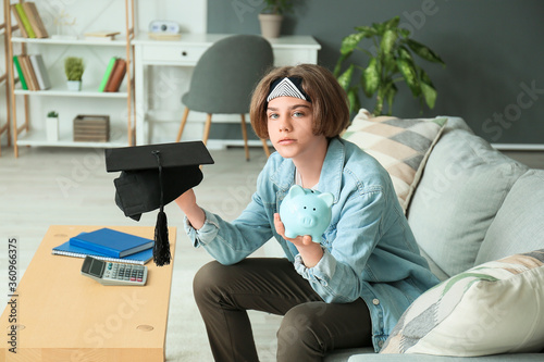 Teenage boy with savings fo...