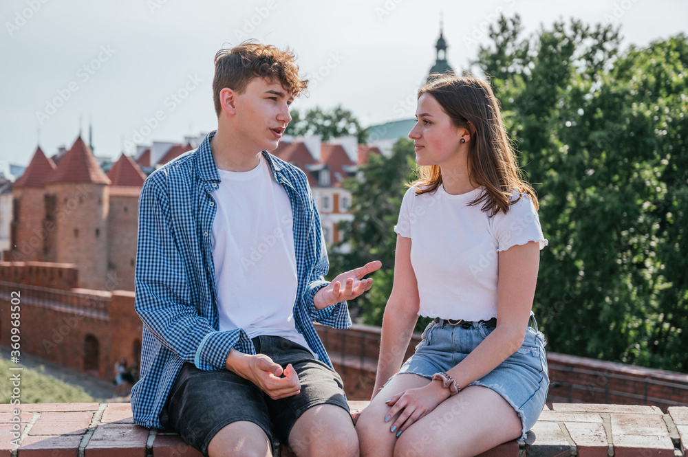 Young couple in love talking and smiling